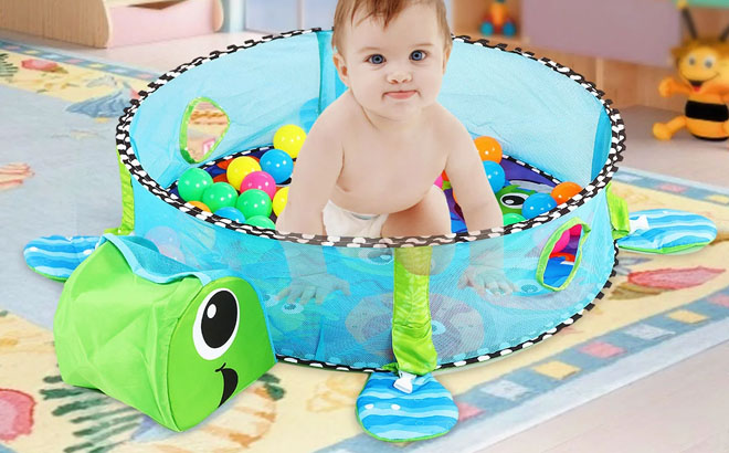 a Baby Playing in a 3 in 1 Baby Gym Play Mat