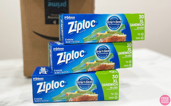3 Boxes of Ziploc 30 Count XL Sandwich and Snack Bags on a Countertop in front of an Amazon Box