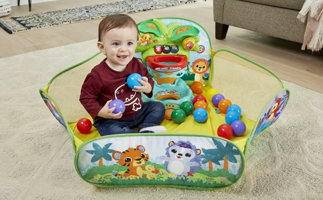 A Baby Playing Inside the VTech Ball Pit Learning Toy with Balls