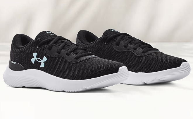 A Pair of Under Armour Womens Mojo 2 Sportstyle Shoes