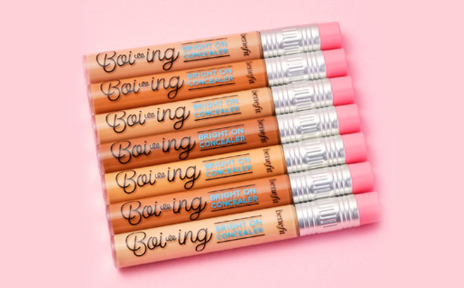 Benefit Cosmetics Boi ing Bright On Brightening Concealers on a Pink Table
