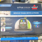 Bissell Little Green Portable Carpet Cleaner on a Shopping Cart