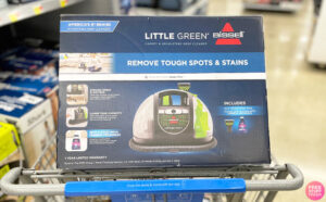 Bissell Little Green Portable Carpet Cleaner on a Shopping Cart