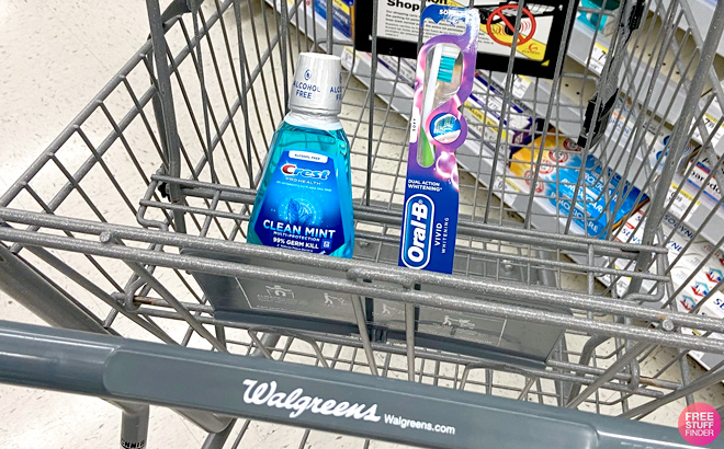 Crest and Oral B Dental Care in a cart at Walgreens