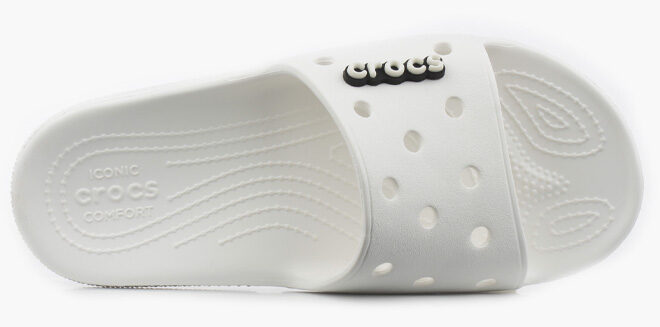 Crocs White Classic Slides on White Background