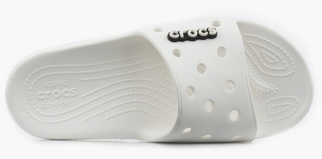 Crocs White Classic Slides on White Background Crocs White Classic Slides on White Background
