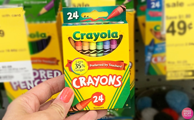Hand Holding Crayola 24 Count Crayons at Walgreens