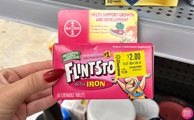 Hand Holding Flintstones Kids Chewable Vitamins 60 Count