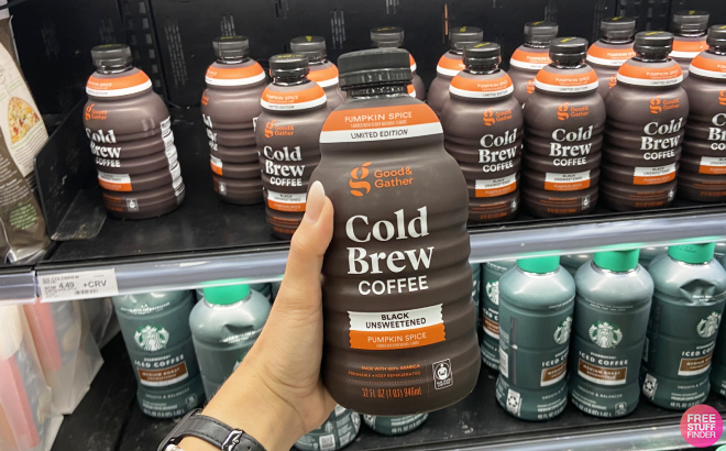 Hand Holding a Bottler of Good Gather Pumpkin Spice Cold Brew Coffee