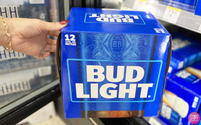 Hand Holding a Box of Bud Light Beer
