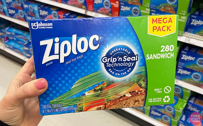 Hand Holding a Ziploc 280 Count Sandwich and Snack Bags Box