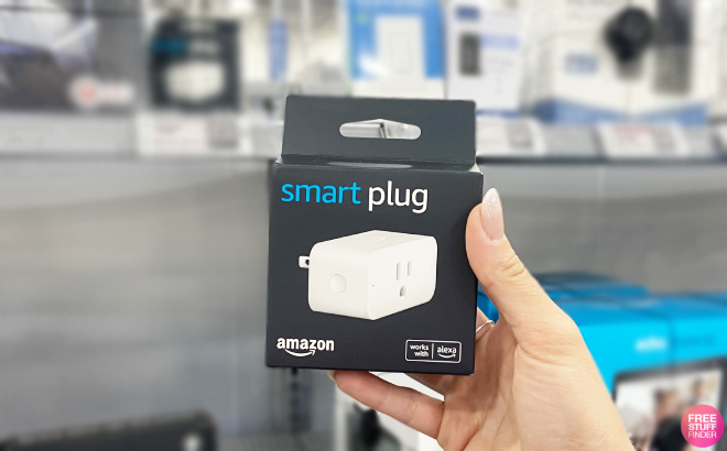 Hand Holding an Amazon Smart Plug