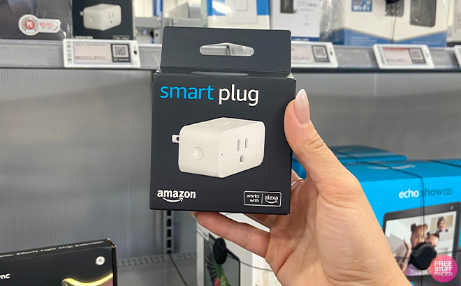 Hand Holding the Box of Amazon Smart Plug