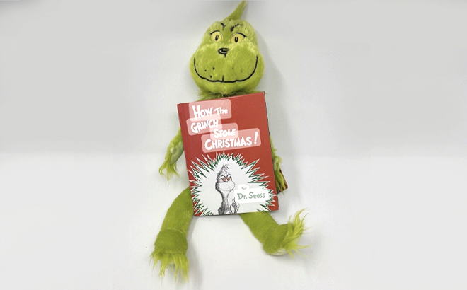 How The Grinch Stole Christmas Plush and Book Bundle Lean on the Wall
