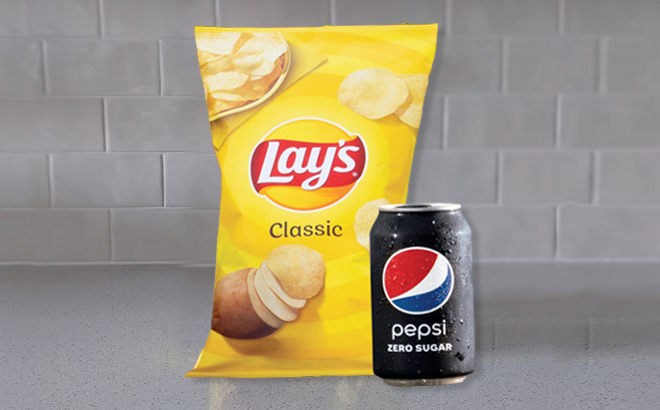 Lays Classic Chips and Pepsi in Can on the Table