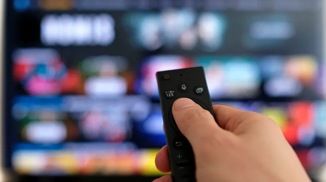 Remote Control Pointed to a TV Remote Control Pointed to a TV