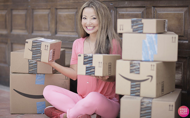 Tina Holding Amazon Boxes on a Front Porch Tina Holding Amazon Boxes on a Front Porch