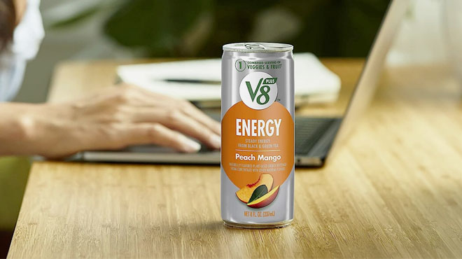 V8 Plus Energy Drink Peach Mango on the table