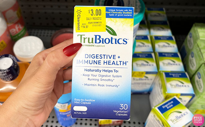 Woman Holding TruBiotics Digestive Immune Health Veg Capsules 30 Count
