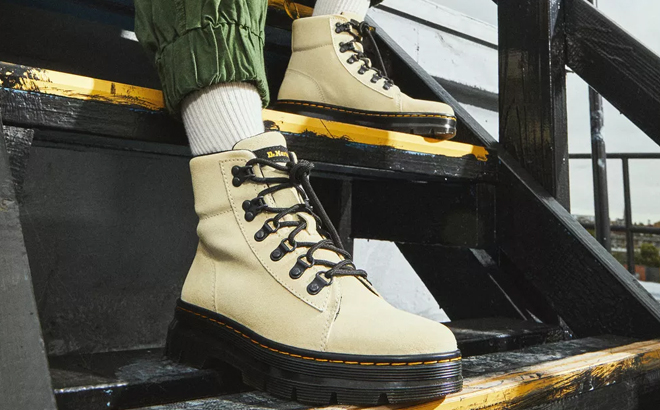 Woman Wearing Dr Martens Combs Suede Casual Boots in Cream Color