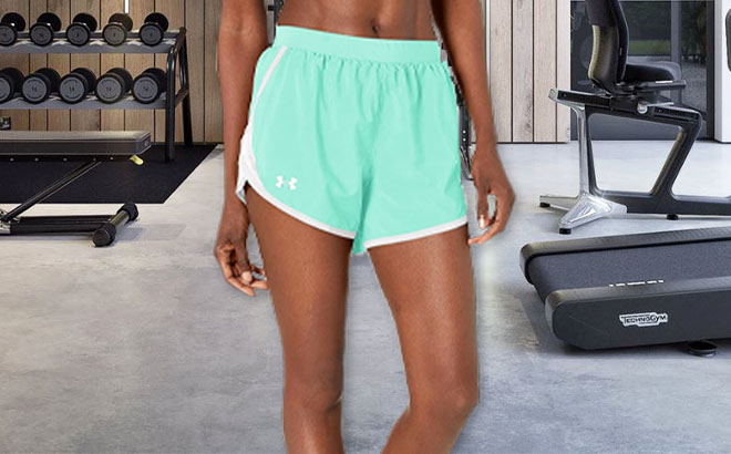 Woman Wearing Under Armour Fly By 2 0 Running Shorts