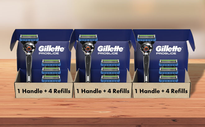 3 Gillette Fusion ProGlide Razor 4 Razor Blade Refills on a Table