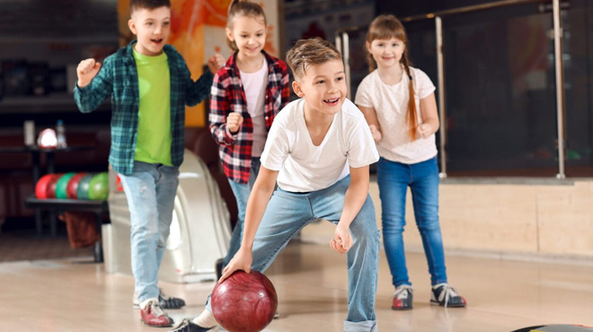 A Group of Kids PLaying Bowling