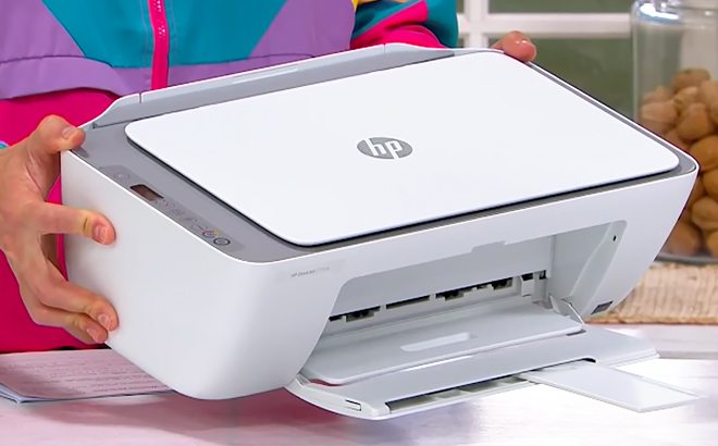 A Person Holding HP DeskJet Wireless All in One Printer