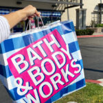 A Person Holding a Bath & Body Works Shopping Bag