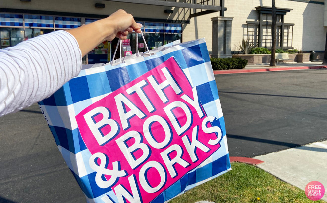 A Person Holding a Bath & Body Works Shopping Bag