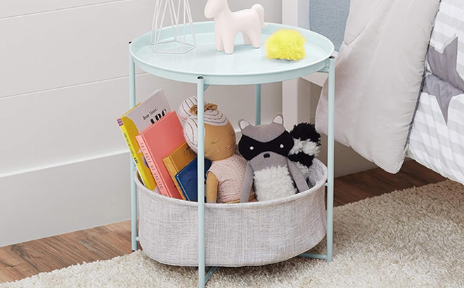 Amazon Basics Round Storage End Table in Mint Green Color Filled with Toys and Books
