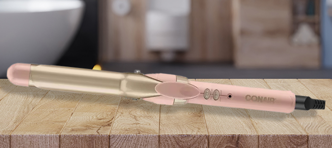 Conair Double Ceramic 1 Inch Curling Iron on a Bathroom Counter Conair Double Ceramic 1 Inch Curling Iron on a Bathroom Counter