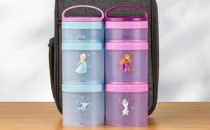 Disney Whiskware Frozen 2 Pack Stackable Snack Containers on a Table