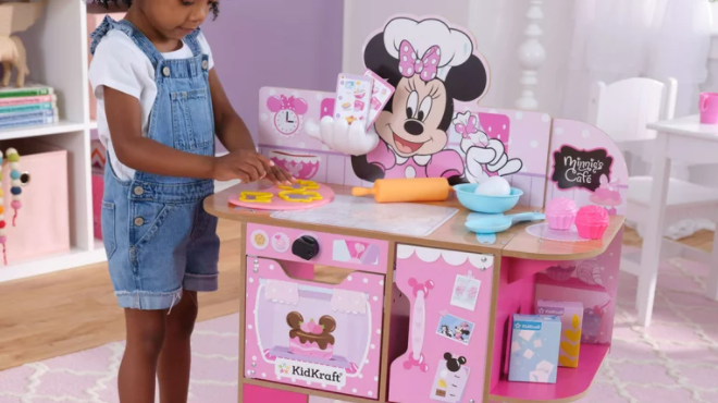 Girl Playing with KidKraft Minnie Mouse Bakery Play Kitchen