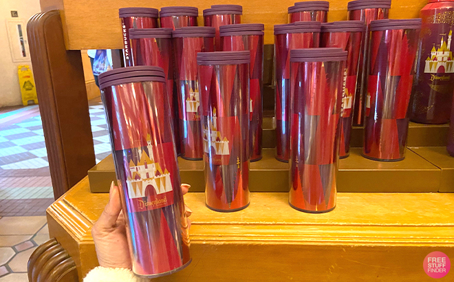 Hand Holding The Walt Disney World Resort Logo and Cinderella Castle Starbucks Travel Tumbler Hand Holding The Walt Disney World Resort Logo and Cinderella Castle Starbucks Travel Tumbler