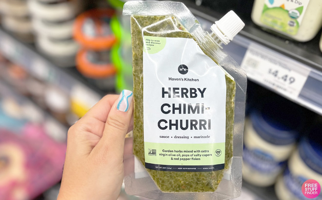 Hand Holding a Havens Kitchen Fresh Sauce Herby Chimichuri Flavor