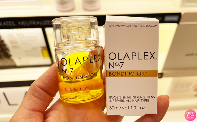 Hand Holding a Olaplex No 7 Bond Oil 1 Ounce