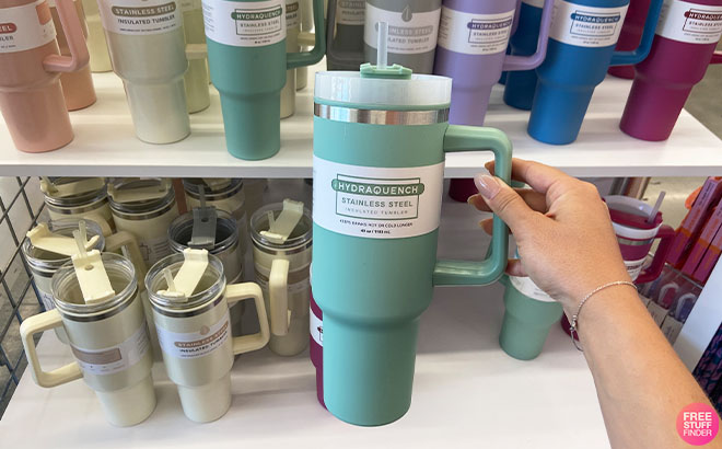 https://www.freestufffinder.com/wp-content/uploads/2023/08/Hand-Holding-a-Stainless-Steel-Insulated-Tumbler-in-Green-Color.jpg