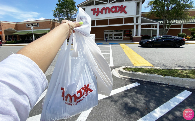 Hand Holding a TJ Maxx Plastic Bag Outside the Store