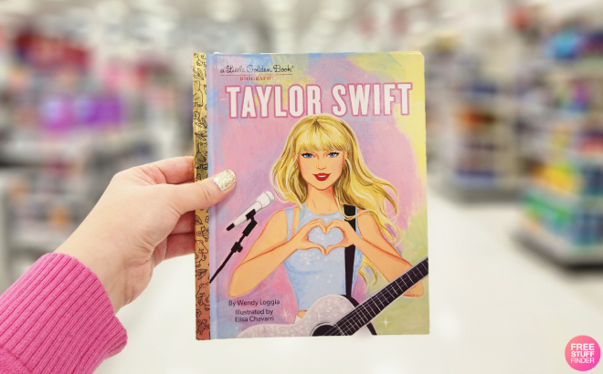 Hand Holding a Taylor Swift A Little Golden Book Biography