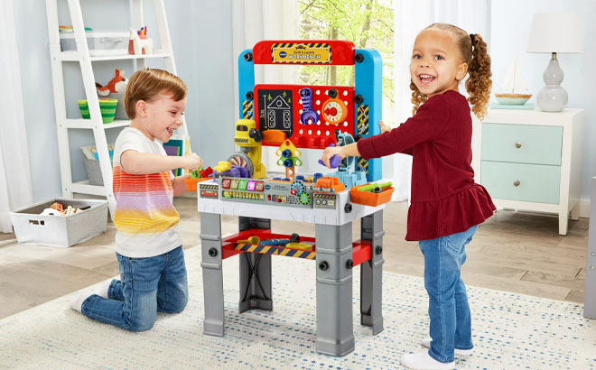 Kids Playing VTech Drill and Learn Workbench