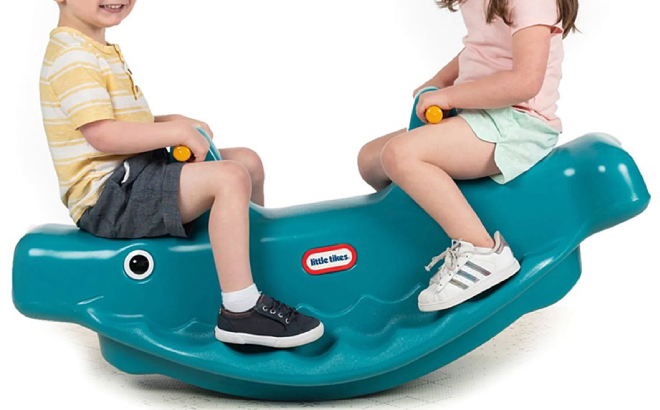 Kids Riding Little Tikes Whale Teeter Totter