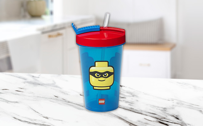 LEGO Blue Red Tumbler Straw on the kitchen table