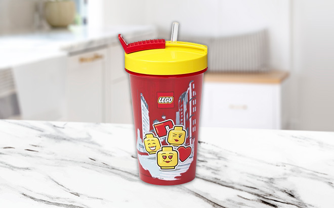 LEGO Red Yellow Tumbler Straw on the kitchen table