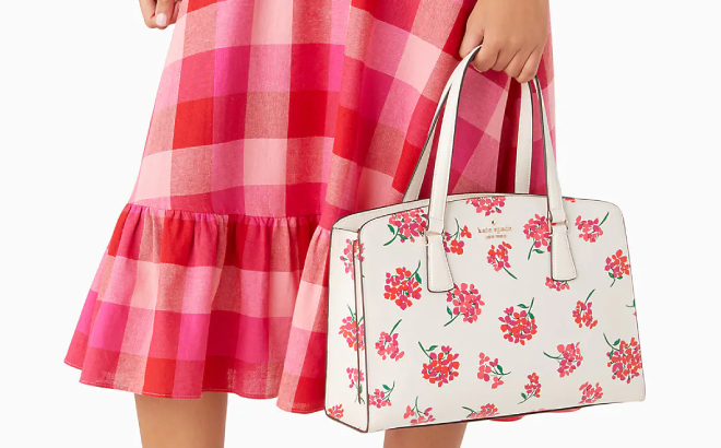 Lady Holding a Kate Spade Perry Floral Medium Satchel