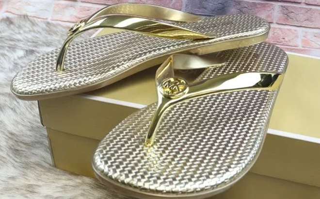 Michael Kors Jet Set Metallic PVC Flip Flop in GOLD