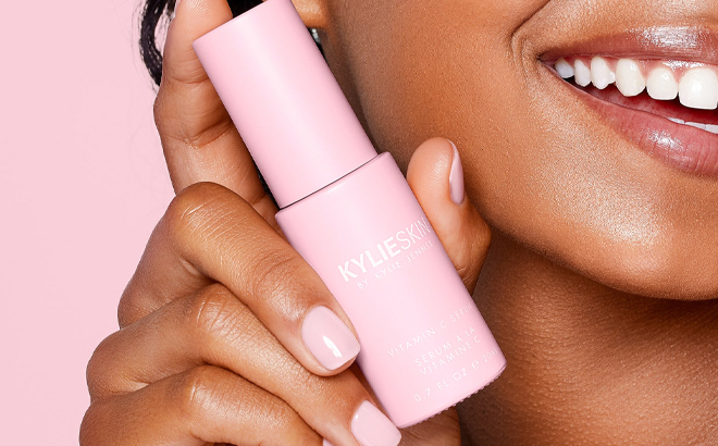 Model Holding Kylie Cosmetics Vitamin C Serum
