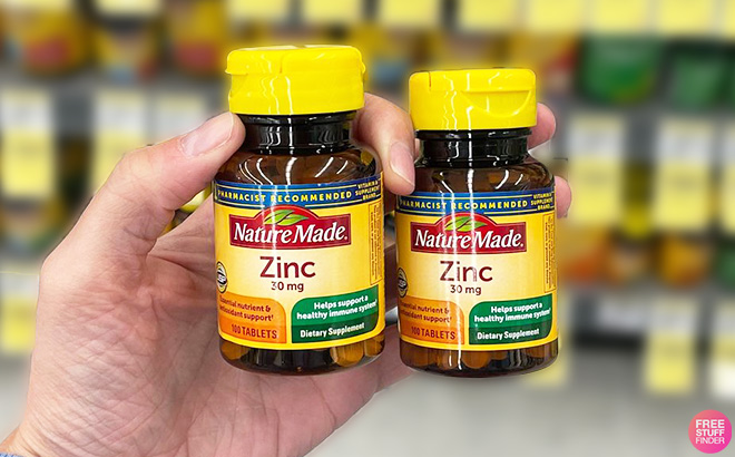 Nature Made Zinc 100 Count Bottles in Hand
