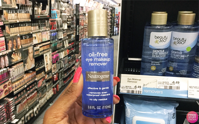 Person Holding a Neutrogena Oil Free Eye Makeup Remover Person Holding a Neutrogena Oil Free Eye Makeup Remover