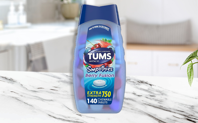 TUMS Smoothies Extra Strength Antacid Tablets for Chewable Heartburn Relief on a Kitchen Table